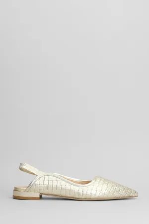 Ballet flats in gold leather