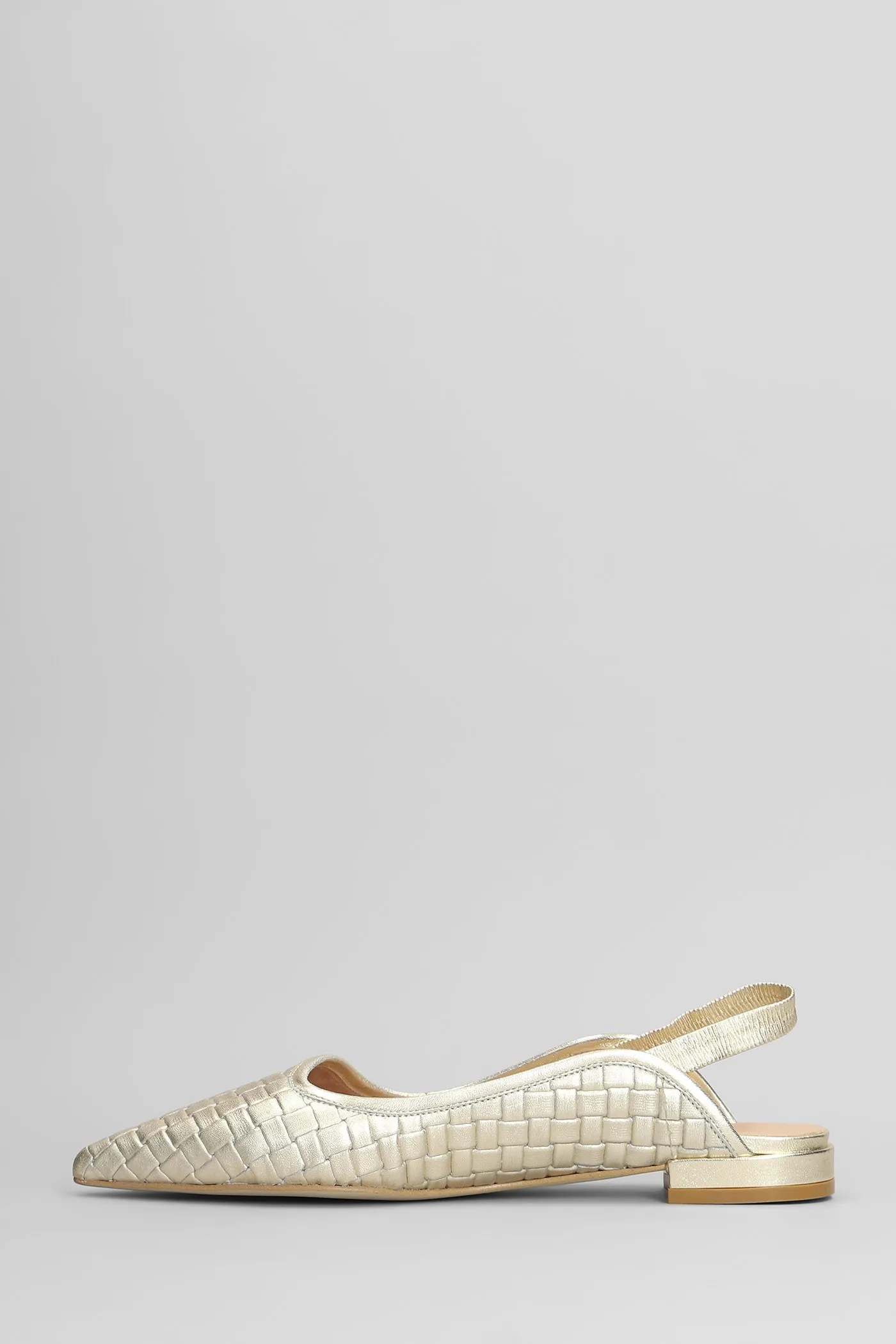 Ballet flats in gold leather