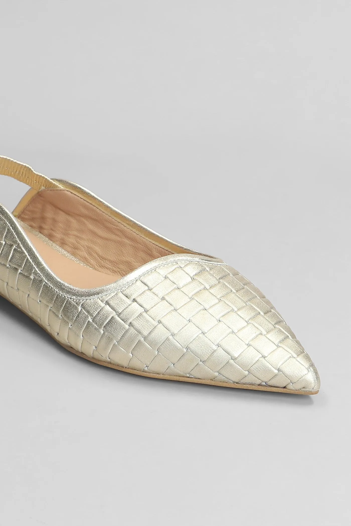 Ballet flats in gold leather