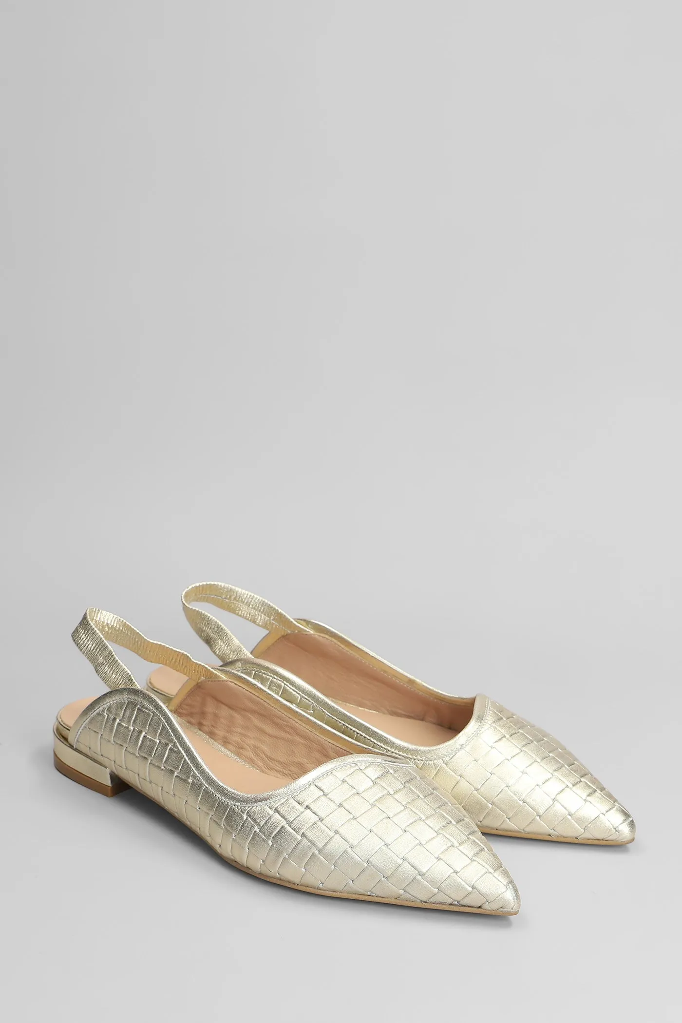Ballet flats in gold leather
